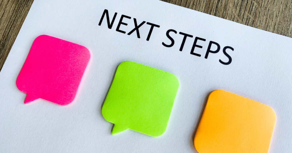Sticky notes with 'Next Steps' written above, symbolising guidance and planning after divorce.